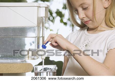 Young Girl Pouring Filtered Water View Large Photo Image Stock Photograph - Young Girl Pouring Filtered Water. Fotosearch