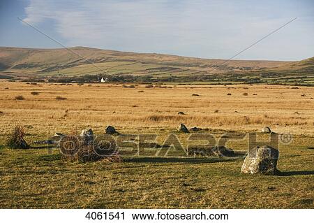 Stock Image - 16 Blue stones form an egg-shaped ring at Gors Fawr Stone Circle in a field near village of Mynachlog-ddu; Pembrokeshire, Wales. Fotosearch