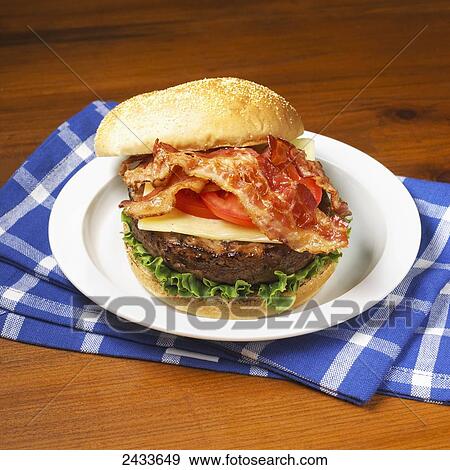 A bacon cheeseburger View Large Photo Image Stock Photo - A bacon cheeseburger. Fotosearch