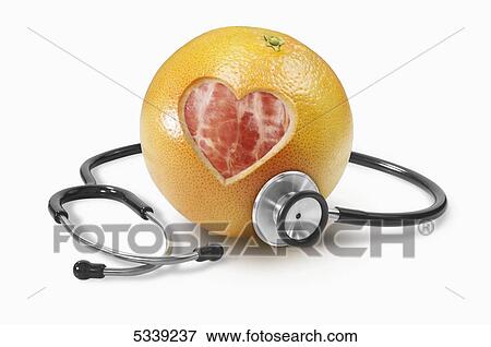 Stock Photo - A heart shape cut into a grapefruit with a stethoscope. Fotosearch