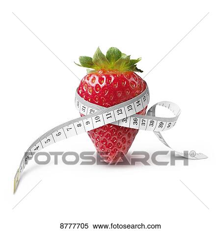 Stock Photography - A measuring tape wrapped around a strawberry. Fotosearch