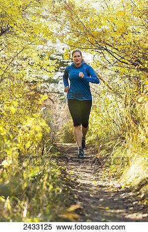 A young woman hiking on Sypes trail near Bozeman; Montana, United States of America View Large Photo Image Stock Photography - A young woman hiking on Sypes trail near Bozeman; Montana, United States of America. Fotosearch