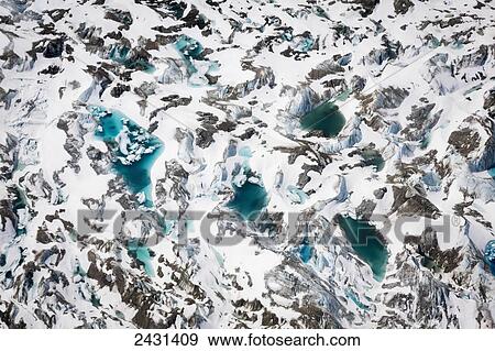 Aerial view of a glacier in the Alaska range, Interior Alaska; Alaska, United States of America View Large Photo Image Stock Photo - Aerial view of a glacier in the Alaska range, Interior Alaska; Alaska, United States of America. Fotosearch