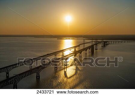 Aerial view of Bay Bridge at sunset over Chesapeake Bay; Maryland, United States of America View Large Photo Image Stock Image - Aerial view of Bay Bridge at sunset over Chesapeake Bay; Maryland, United States of America. Fotosearch