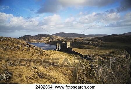Arid mountainous landscape with ruins of wall and building in West Cork; County Cork, Ireland View Large Photo Image Picture - Arid mountainous landscape with ruins of wall and building in West Cork; County Cork, Ireland. Fotosearch
