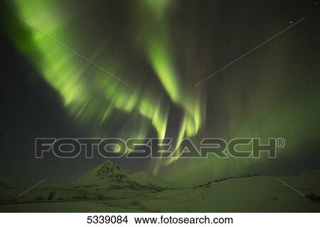 Picture - Aurora Borealis, or Northern Lights, along the Dempster Highway; Yukon, Canada. Fotosearch
