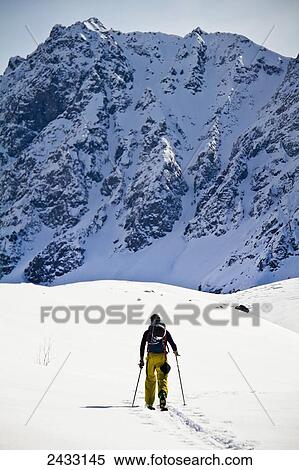 Backcountry ski mountaineering near Eagle River, Western Chugach Mountains, Southcentral Alaska; Alaska, United States of America View Large Photo Image Stock Photography - Backcountry ski mountaineering near Eagle River, Western Chugach Mountains, Southcentral Alaska; Alaska, United States of America. Fotosearch
