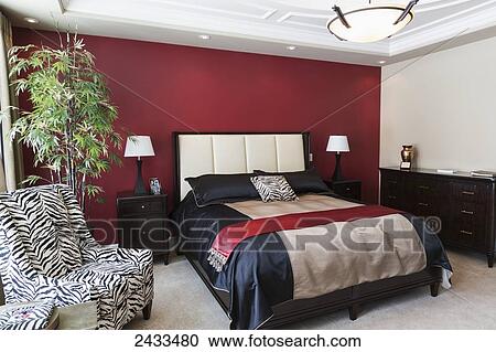 Stock Image - Bedroom in luxurious custom built estate home; Edmonton, Alberta, Canada. Fotosearch