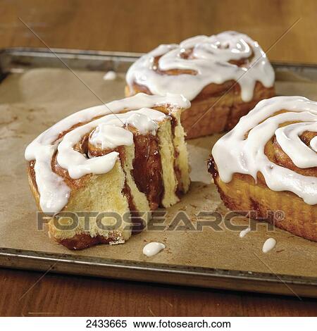 Stock Photography - Cinnamon buns on a tray. Fotosearch