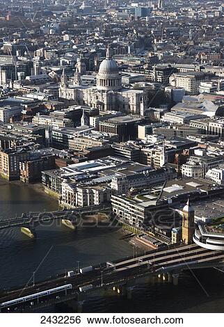 Cityscape of London and the River Thames with a view of St. Paul's Cathedral; London, England View Large Photo Image Stock Photograph - Cityscape of London and the River Thames with a view of St. Paul's Cathedral; London, England. Fotosearch