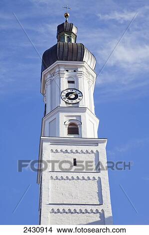 Clock tower against a blue sky topped with a cross; Landsberg, Bayern, Germany View Large Photo Image Picture - Clock tower against a blue sky topped with a cross; Landsberg, Bayern, Germany. Fotosearch