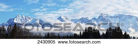 Stock Photography - Clouds and the Alps; Karwendelgebirge, Bayern, Germany. Fotosearch