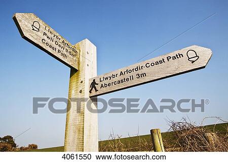 Coastal path signpost, Pembrokeshire Coast Path, near Aber Mawr; Pembrokeshire, Wales View Large Photo Image Stock Image - Coastal path signpost, Pembrokeshire Coast Path, near Aber Mawr; Pembrokeshire, Wales. Fotosearch