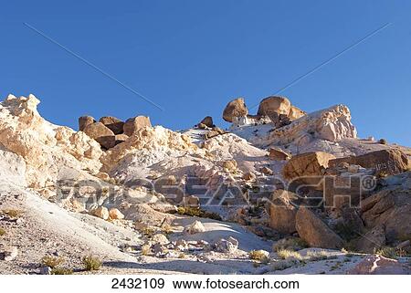 Colourful desert rock formation in late afternoon light; Mendoza, Argentina View Large Photo Image Stock Photo - Colourful desert rock formation in late afternoon light; Mendoza, Argentina. Fotosearch