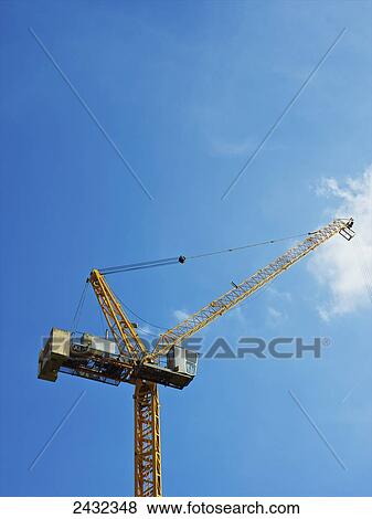 Crane against a blue sky; London, England View Large Photo Image Stock Photo - Crane against a blue sky; London, England. Fotosearch