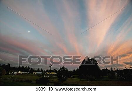 Dramatic clouds spread across the evening sky; Astoria, Oregon, United States of America View Large Photo Image Stock Image - Dramatic clouds spread across the evening sky; Astoria, Oregon, United States of America. Fotosearch