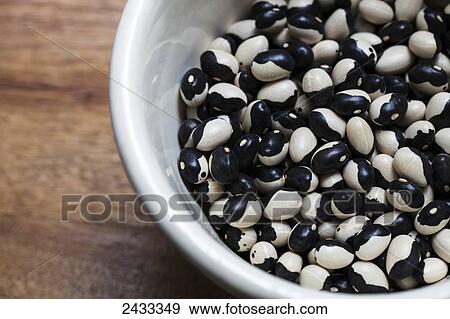 Dried Orca beans, an heirloom variety, also called Calypso and Yin Yang beans because of their black and white coloration; Toronto, Ontario, Canada View Large Photo Image Stock Photo - Dried Orca beans, an heirloom variety, also called Calypso and Yin Yang beans because of their black and white coloration; Toronto, Ontario, Canada. Fotosearch