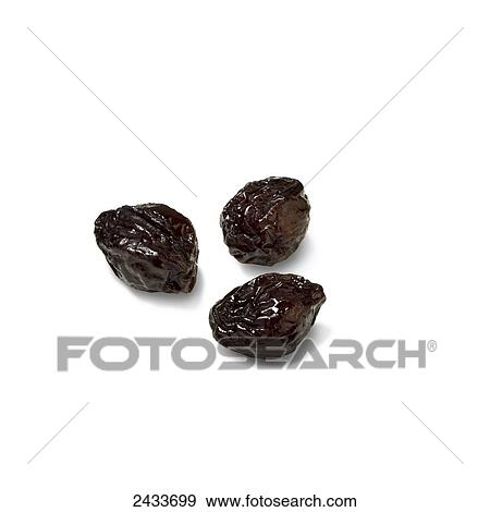 Stock Photo - Dried prunes on a white background. Fotosearch