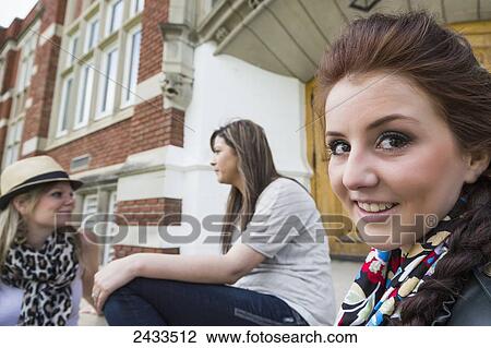 Friends hanging out on steps of school; Edmonton, Alberta, Canada View Large Photo Image Stock Image - Friends hanging out on steps of school; Edmonton, Alberta, Canada. Fotosearch