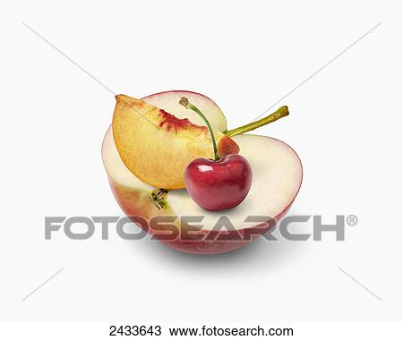 Half an apple with a slice of peach and a cherry on a white background View Large Photo Image Stock Image - Half an apple with a slice of peach and a cherry on a white background. Fotosearch