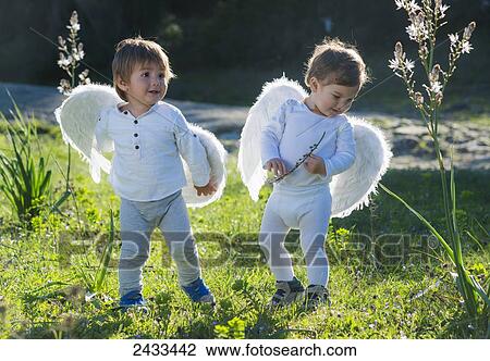 Happy babies with wings; Tarifa, Cadiz, Andalusia, Spain View Large Photo Image Stock Image - Happy babies with wings; Tarifa, Cadiz, Andalusia, Spain. Fotosearch