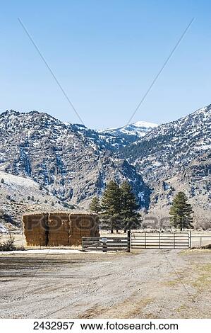 Hay stack in front of the Warner Mountains, Modoc County; California, United States of America View Large Photo Image Stock Photo - Hay stack in front of the Warner Mountains, Modoc County; California, United States of America. Fotosearch