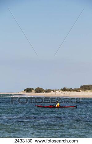 Kayaking off the coast; Queensland, Australia View Large Photo Image Stock Image - Kayaking off the coast; Queensland, Australia. Fotosearch
