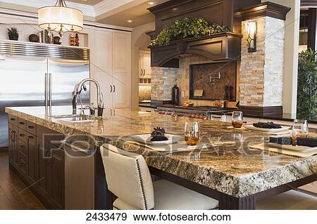 Kitchen in luxurious custom built estate home; Edmonton, Alberta, Canada View Large Photo Image Stock Photo - Kitchen in luxurious custom built estate home; Edmonton, Alberta, Canada. Fotosearch