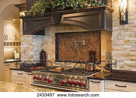 Stock Photo - Kitchen in luxurious custom built estate home; Edmonton, Alberta, Canada. Fotosearch