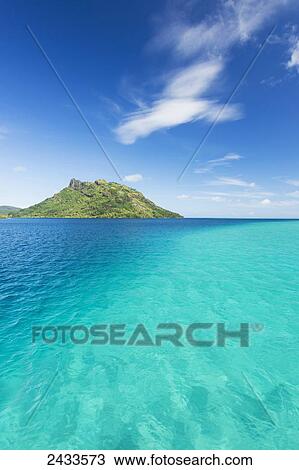 Lagoon and tropical blue water; Huahine, French Polynesia View Large Photo Image Stock Image - Lagoon and tropical blue water; Huahine, French Polynesia. Fotosearch