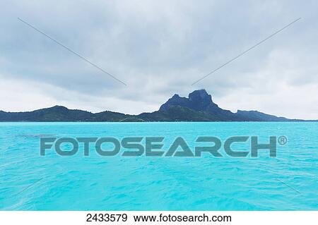 Lagoon in Bora Bora on stormy day, with view of Ute Manu mountain; Bora Bora, French Polynesia View Large Photo Image Stock Photo - Lagoon in Bora Bora on stormy day, with view of Ute Manu mountain; Bora Bora, French Polynesia. Fotosearch