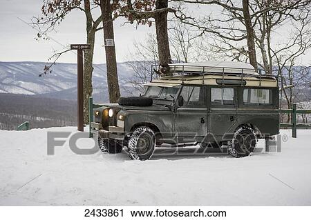 Land Rover parked near Point Lookout sign in Green Ridge State Forest; Orleans, Maryland, United States of America View Large Photo Image Stock Image - Land Rover parked near Point Lookout sign in Green Ridge State Forest; Orleans, Maryland, United States of America. Fotosearch