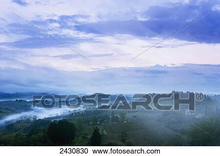 Landscape with low cloud, near San Gimignano; Tuscany, Italy View Large Photo Image Stock Image - Landscape with low cloud, near San Gimignano; Tuscany, Italy. Fotosearch
