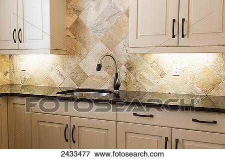 Stock Photo - Laundry room in luxury custom built estate home; Edmonton, Alberta, Canada. Fotosearch