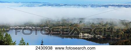 Stock Photo - Low cloud hanging over Muckross Lake; Killarney, County Kerry, Ireland. Fotosearch