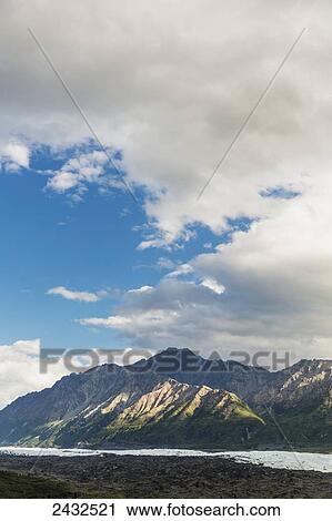 Stock Image - Matanuska Glacier and the Chugach Mountains from the Matanuska Glacier overlook on the Glen highway; Alaska, United States of America. Fotosearch