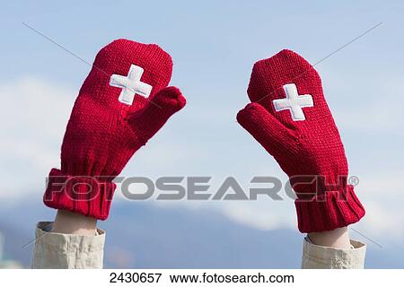 Mittens with the Swiss flag symbol; Ascona, Ticino, Switzerland View Large Photo Image Stock Photo - Mittens with the Swiss flag symbol; Ascona, Ticino, Switzerland. Fotosearch