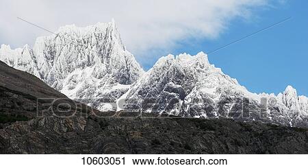 Stock Image - Mountains in Torres del Paine National Park; Torres del Paine, Magallanes and Antartica Chilena Region, Chile. Fotosearch