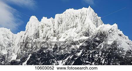 Stock Image - Mountains in Torres del Paine National Park; Torres del Paine, Magallanes and Antartica Chilena Region, Chile. Fotosearch