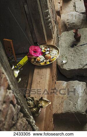 Stock Photography - Offering dish, a Buddhist deity, Nepalese New Year Festival; Bahktapur, Kathmandu Valley, Nepal. Fotosearch