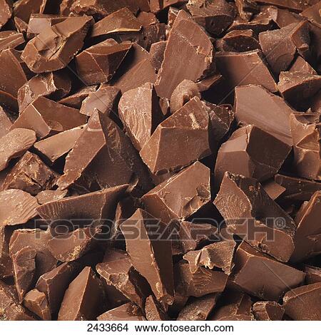 Pieces of milk chocolate View Large Photo Image Picture - Pieces of milk chocolate. Fotosearch