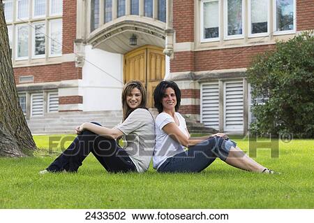 Portrait of a mother and daughter together in a school yard; Edmonton, Alberta, Canada View Large Photo Image Stock Image - Portrait of a mother and daughter together in a school yard; Edmonton, Alberta, Canada. Fotosearch