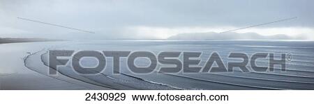 Ripples of water coming into the shore in the fog; Inch, County Kerry, Ireland View Large Photo Image Stock Photo - Ripples of water coming into the shore in the fog; Inch, County Kerry, Ireland. Fotosearch