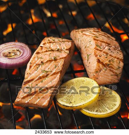 Stock Image - Salmon on the grill. Fotosearch