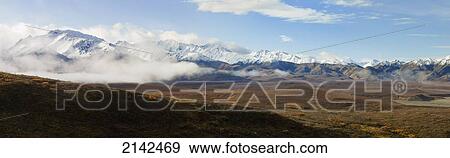 Stock Photo - Scenic Panorama View Of Polychrome Pass Basin In The Fall With The Alaska Range In The Background, Denali National Park, Interior, Alaska. Fotosearch