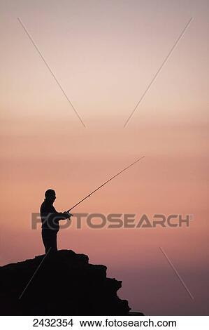 Silhouette of a man fishing at sunset; Caloundra, Queensland, Australia View Large Photo Image Picture - Silhouette of a man fishing at sunset; Caloundra, Queensland, Australia. Fotosearch