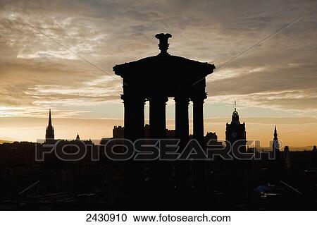 Stock Image - Silhouette of Dugald Stewart Monument on Calton Hill; Edinburgh, Scotland. Fotosearch