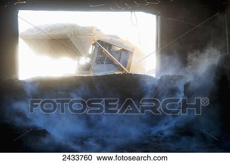 Skid steer loader removing chicken manure; Hurlock, Maryland, United States of America View Large Photo Image Stock Image - Skid steer loader removing chicken manure; Hurlock, Maryland, United States of America. Fotosearch