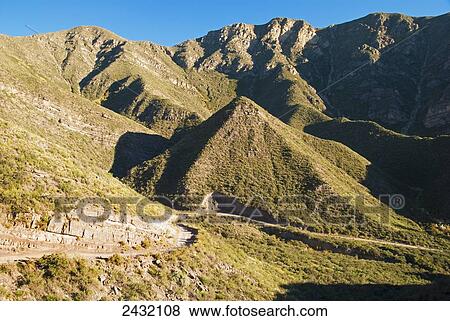 Steep dirt road in the Andes; Mendoza, Argentina View Large Photo Image Stock Photo - Steep dirt road in the Andes; Mendoza, Argentina. Fotosearch
