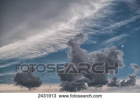 Storm clouds gather and grow in the sky; Bolivia View Large Photo Image Stock Image - Storm clouds gather and grow in the sky; Bolivia. Fotosearch